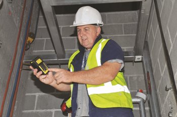 Alex Griffiths checks CO2 levels with the gas detector from Kennards Lift & Shift.