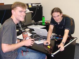 Blake Newman and David Kooymans working on FLECK nano. Image by Samuel Klistorner, CSIRO.