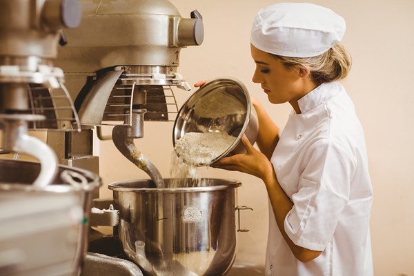 If you mix large amounts of dough, a spiral mixer operates with a fixed agitator and spinning bowl and can mix high volumes.
