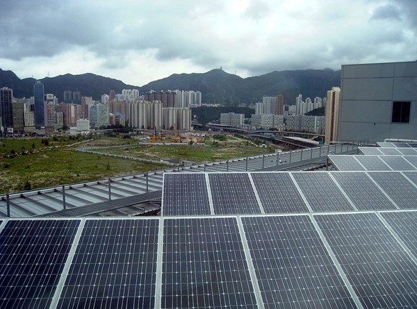 Residents near big solar projects are often concerned they cause glare and noise. Electrical and Mechanical Services Department Headquarters rooftop solar, Hong Kong/Wikimedia Commons