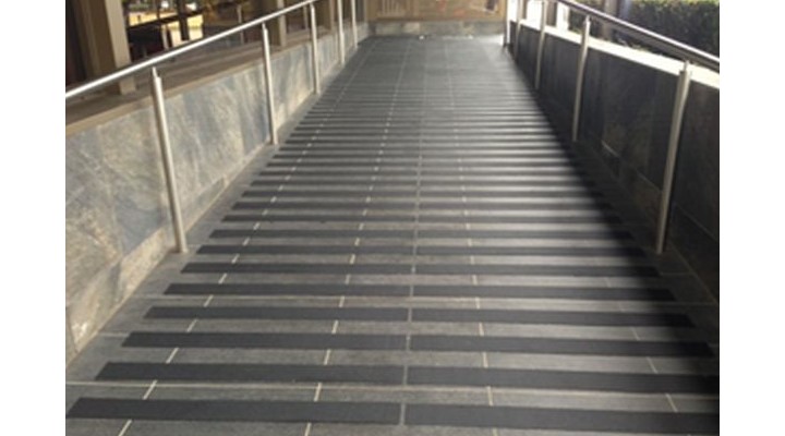 RSL CLub tiled ramp after Safe Grip Ultimate anti slip strips installed