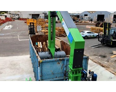 Roller Packers Crushing Pallets | WOOD 