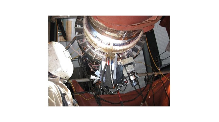 An automatic orbital weld is made on a large-diameter pipe at Bechtel Power’s Trimble County Two project.