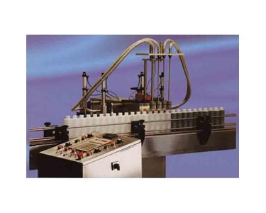 Mourpak - Four Head Positive Displacement Liquid Filling Machine