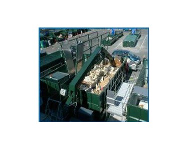 Roller Packers Crushing Pallets | WOOD 