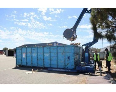 Roller Packers Crushing Pallets | WOOD 