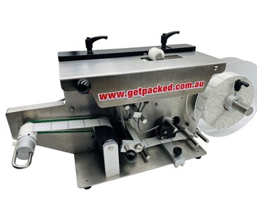 Compact Security Label Applicator for applying labels over corners