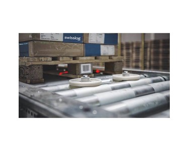 Swisslog - Automated Pallet Conveyor | ProMove