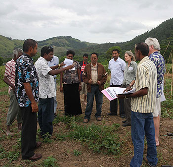 CAPTION: Workshop participants visit a farm to learn about the challenges faced by growers in producing vegetables for market.