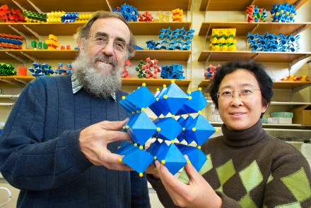 Ray Withers and Yun Liu with the chemical model of the new material. (Image: Australian National University)