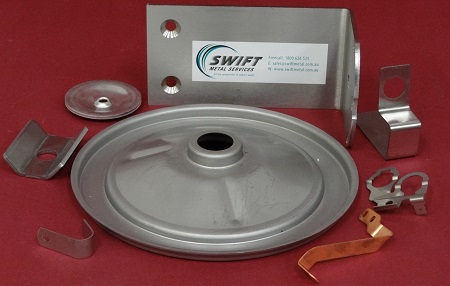 Pressed metal components produced in Australia by Swift Metal Services.