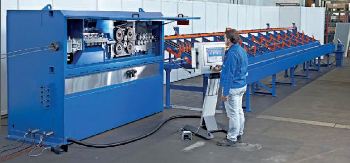 Twincut 12 roller straightening machine equipped with a rebar storage unit.