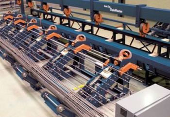 Pedax Spinmaster for automated roll mat production.
