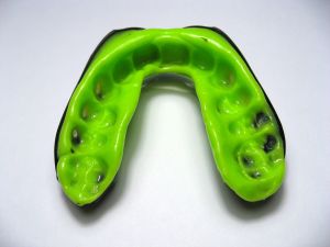'Custom-fitted mouthguards over the 'boil and bite' variety as these provide the most effective protection.'