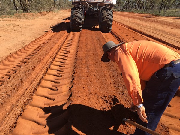 Moisture check during road stabilisation. Photo c/o Isaac Regional Council
