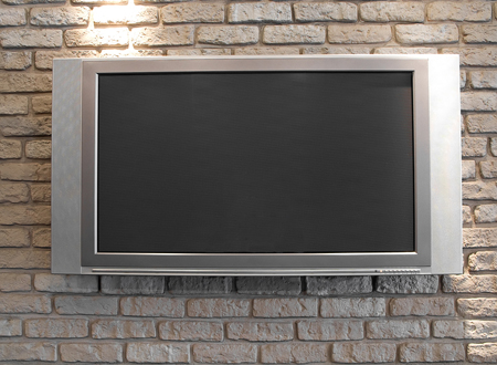 Use TV monitors with short, looped video demonstrations or testimonial presentations; anything that flickers in their peripheral vision and gets attention.