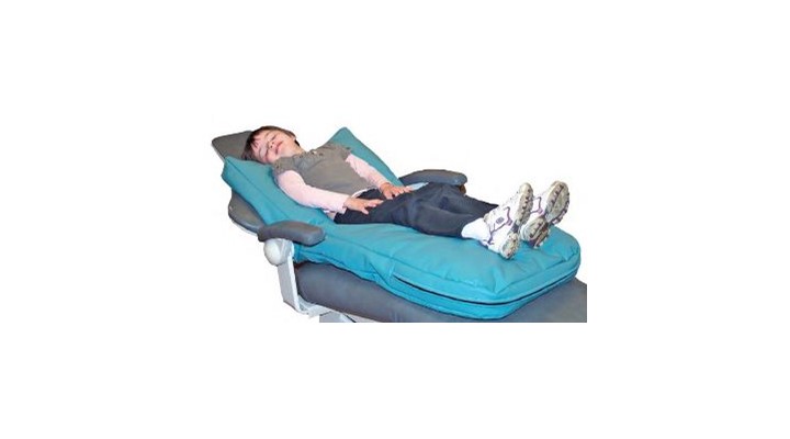 The Stay N Place Chair Liner curves in at the neck, allowing your patient's head to tilt back and the chest to be lifted, while leaving you room to maneuver. 