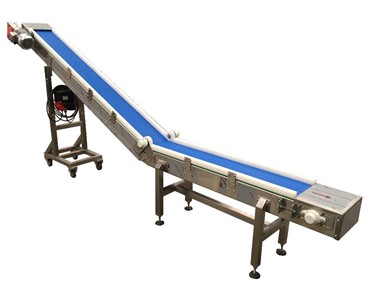Inclined conveyor for tablets