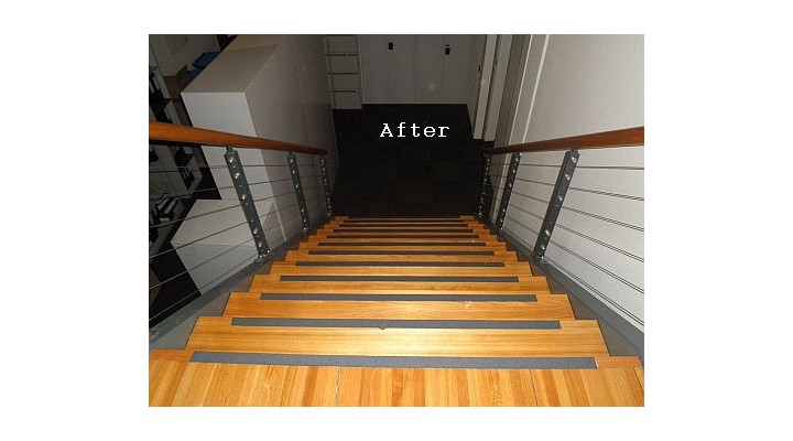 Wooden stairs with aluminium stair nosing after