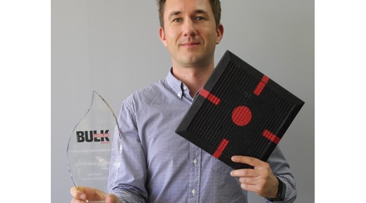 Air Springs Supply Technical Product Manager James Maslin with the bulk handling award