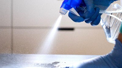 How do you clean a Modsel procedure chair?