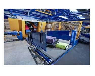 Automated Container Unloader | Baggage Handling Systems