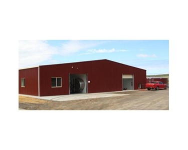 Action Steel Industries - 21m Span Rotary Dairy Shed with Roller Doors