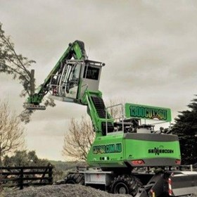 718 Tree Care and Material Handling machine