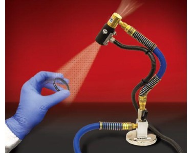 The Model 8194-9362 Gen4 Stay Set Ion Air Jet Kit cleans dust from a glass lens prior to installation on a gauge.