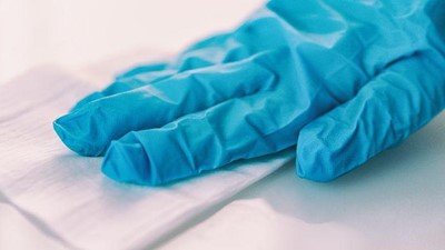 How do you clean a medical stretcher?