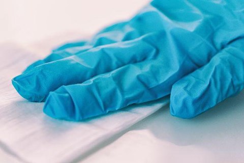 How do you clean a medical stretcher?