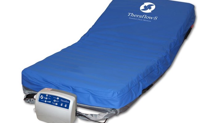 A mattress replacement lies directly on the bedframe