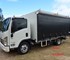 Isuzu - Used Curtainside Truck | NPR 75-190 MWB AMT Auto - 6 Pallet 